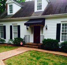 Black And White Awning Fabric Black Fabric Awning Installed Over Front Entrance Of Home Awning Over Door Door Awnings Fabric Awning