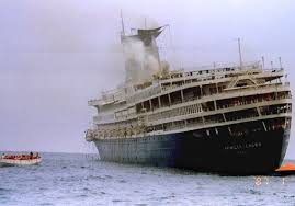 Lessons in the politics and prejudice of terrorism by michael k. Passengers Of The Achille Lauro Leave The Burning Italian Cruise Ship Aboard A Life Boat Nov Description From Marke Italian Cruises Cruise Ship Passenger Ship