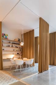 Curtains Separate Spaces In Lisbon Offices Interior Office Curtain Plywood Division Working Space Home Curtains Office Interiors Home
