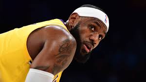 LeBron James to miss 'at least one week' because of abdominal strain,  source says