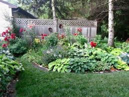 Lilly Flower Beds Issue With This Garden Is The Chipmunks Who Like To Eat My Lily Bulbs Backyard Flowers Garden Garden Beds Container Gardening