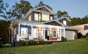 The home was raised to allow for a new entry, meeting space, stair and car accommodation. Hamptons Inspired Traditional Queenslanders