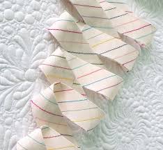 Then, run the rotary cutter along the edge of the ruler to cut this 0.5 in (1.3 cm) strip off of the rectangle. How To Make Continuous Bias Binding For Quilts Geta S Quilting Studio