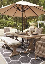 Beachcroft Dining Table With Umbrella Option Beige Wintergarden Outdoor Dining Spaces Backyard Dining Backyard Furniture