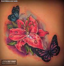 Tatuaje De Flores Lirios Mariposas Zonatattoos Com Tatuajes De Flores Fotos De Tatuajes Tatuaje De Manga De Flores