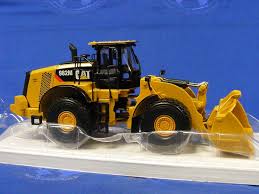This machine meets emission standards and is designed to improve fuel economy without interrupting performance. Buffalo Road Imports Caterpillar 982m Wheel Loader Construction Wheel Loaders Diecast Model Norscot Diecast Scale Models