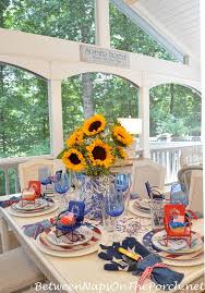 Napkins were both a red and white checkered one and a blue one tied with a piece of patriotic ribbon. Celebrating The Red White Blue For This Tablescape Thursday Between Naps On The Porch