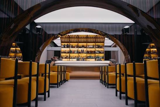 Milan. Welcome to Vesta, a posh fish restaurant and cocktail bar in the  Brera district. ALPI Amara Ebony contributes hugely to enriching the  atmosphere with drama. The striped wood is coated with