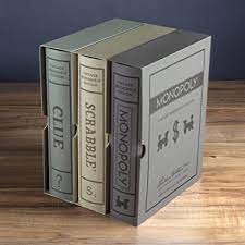 Open the book and it will reveal premium components inspired by the 1935 edition. Amazon Com Scrabble Monopoly And Clue Vintage Board Game Bookshelf Collection Toys Games