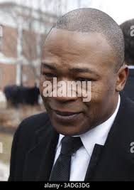Former NFL player Joe Thomas, left, and his wife Annie unveil his bust  during his induction into the Pro Football Hall of Fame in Canton, Ohio,  Saturday, Aug. 5, 2023. (AP Photo/David