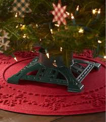 Place the tree stand on top of the sheet and plastic. Heirloom Cast Iron Christmas Tree Stand