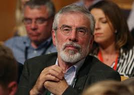 How old is Gerry Adams, who is the former Sinn Fein leader's wife Colette  McArdle and when was their Belfast home attacked?