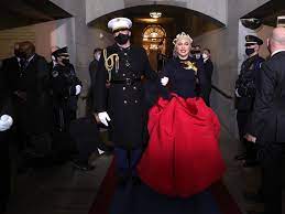 Not only was lady gaga rocking a giant dove broach that resembles the famous mockingjay from the hunger games, but she lady gaga looking like she ab to announce who will be in the next hunger games she knows how to embrace the moment. Lady Gaga S Inauguration Outfit Has The Hunger Games Vibes Fans Say