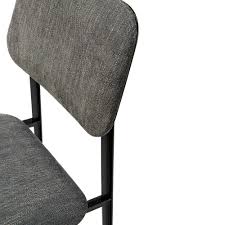 The back of the chair has a barrel design that cradles you in comfort while you enjoy a meal with friends, and the chair is thickly padded and upholstered in plush gray velvet for a luxe feel. Dc Dining Chair Dark Grey Dark Grey