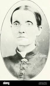 Past and present of Montgomery County, Illinois . EMERY WRIGHT. MR. AND  MRS. JARRETT WRIGHT OF THE UNIVERSITY OF ILLINOIS PAST AND PRESENT 01  MONTGOMERY COUNTY :;;; In 1900 he opened