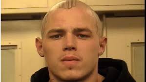 Police look for man connected to car fire where 2 were found dead