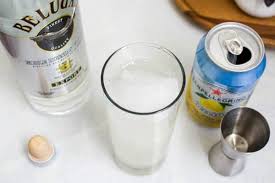 Looking for some uber fancy, quick to make, and delicious to taste drinks to cool off this summer? Vodka Soda With San Pellegrino Limonata Cupcakes And Cutlery