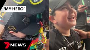 Panthers fan Nicholas Tadros receives NRL premiership ring from Jarome Luai