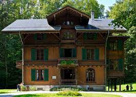 The architectural design using recycled shipping containers is ingenious as freitag sells all kinds of fashion accessories made from recycled materials. The Swiss Chalet Design For The Arts Crafts House Arts Crafts Homes Online