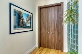 Wooden of metal lifts elevator cabin with closed doors. Modern Interior Doors Renovation In Bucktown Chicago Model Gdev Dec P Glenview Haus Custom Front And Interior Doors Wine Cellars Cabinets