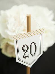 30 diy wedding table number ideas customize your reception by using stylish table numbers as a practical addition to your table's centerpiece and decor. Look At These Unique Diy Table Number Stands