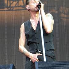 Dave Gahan Of Depeche Mode Good Lord What Is That He Is Holding Brings A Whole New Meaning To Reach Out And Touch Fait Dave Gahan Depeche Mode Martin Gore
