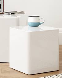 Anchor the living room with a modern coffee table. White Gloss Cubed Side Tables Pairing From Danetti