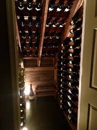 How a small empty space under the stairs was transformed into a custom wine cellar! Under The Stairs Wine Storage Home Wine Cellars Diy Wine Cellar Under Stairs Wine Cellar