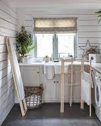 Small utility room storage for cleaning and ironing products. 15 Small Utility Room Ideas Stylish Practical Inspiration Real Homes