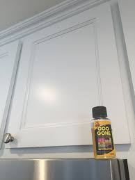 If stains, dried grunge, or grease remain on your cabinets even after you've finished cleaning kitchen cabinets, you'll need to add an extra step. Remove Kitchen Cabinet Grease Like A Miracle Goo Gone The Absolute Best How To Remove Kitchen Cabinets Clean Kitchen Cabinets Kitchen Cabinets