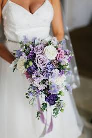Your first choice for premium fresh flowers and upscale design artistry for your dream wedding and all your special occasions! Purple Wedding Bouquets Arabia Weddings