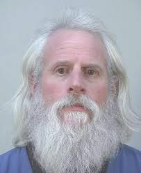 Threatening Wisconsin governor charge dropped under deal