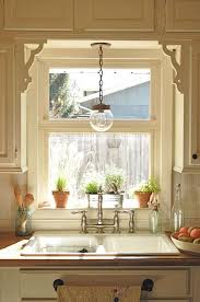 Brackets Toward The Front Of The Cabinets And Curtain Over The Bottom Half Of Window Kitchen Sink Lighting Cottage Kitchens Kitchen Window Treatments