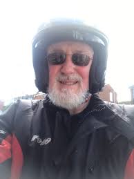 Riding a Triumph cafe racer to the general store