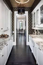 Black And Gold Kitchen Wallpaper Contemporary Pantry Boasts A Gold Leaf Ceiling Displaying A Set Of Black Leather Drum Pendant Contemporary Kitchen Traditional Bedroom Decor Kitchen Wallpaper