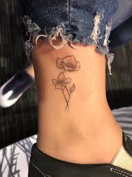 The design is simple, as it has minimal shading and clean outlines. Cultural Home Ankle Tattoo Flower Tattoo On Ankle Dainty Tattoos Tattoos