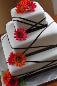 Ribbon Wedding Cake With Gerber Daisies Square Wedding Cakes Square Wedding Cakes Wedding Cake Ribbon Wedding Cakes