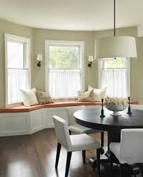 The soft blues, creams and dark woods give the impression of luxury and calm. Bay Window Treatments And Storage Solutions Northview Canada Inc