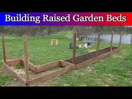 But sometimes simply having a raised garden bed is not enough and an additional 'wall' around it is needed to further keep. Fenced In Garden Area Part 1 Building Raised Beds And Fence Posts Youtube