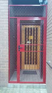 steel security porch enclosure with steel diamond grille installed in caulfield iron door design security door design metal doors design