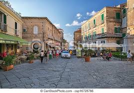 Popular for its healthy red onions, the small town on the tropea, the pearl of the tyrrhenian sea, boasts a unique cultural and artistic heritage: Life On The Streets Of The Beautiful City Of Tropea In Southern Italy Canstock