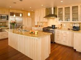 An Island Shaped Modern Kitchen Design With Off White Walls Beautiful Maple Cabinetry Contemporary Kitchen Tables Contemporary Kitchen Maple Kitchen Cabinets