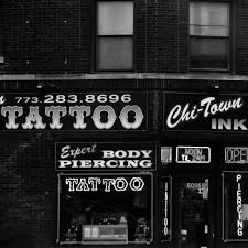 Home to some of the greatest tattooers in the industry, chicago ink artists demonstrate only the highest level of expertise and display exceptional attention to detail in our work. Chicago Tattoo And Piercing Shop Black And White Photograph By Lillith Chicago Tattoo Chicago Tattoo Shops Piercing Shop