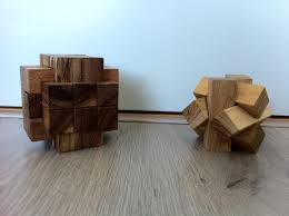 An 18 Piece Burr And A 6 Piece Block Puzzle Wood Puzzles Wooden Puzzles Wooden