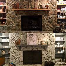 Fireplaces are central to the home. Gray Washing Rock Fire Place Using Chalk Paint Stone Fireplace Makeover Fireplace Remodel Fireplace