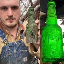 Old bottles found in Michigan, including a Wolverine bottle