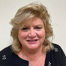 Do you have to stand behind the line to review a serve?