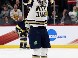 Notre dame fighting irish forward jake evans (18) with the puck during evans saw his senior year at the university of notre dame come to an end after the fighting irish lost to the university of minnesota duluth in the finals of the frozen four over the weekend. Notre Dame Hockey Jake Evans Andrew Oglevie Sign Professional Contracts One Foot Down