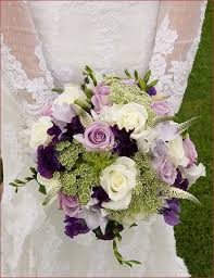 Peonies, orchids, lisianthus, scabiosa, roses, the list goes on and on. Wedding Photography In London Beyond Wedding Bouquets Purple Wedding Flowers Wedding Flowers Bridal Bouquets Wedding Flower Guide