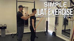 Keep your back straight, fully extend your arms, and then row your. Activate Your Lats Easy Lat Exercise You Can Do At Home Youtube